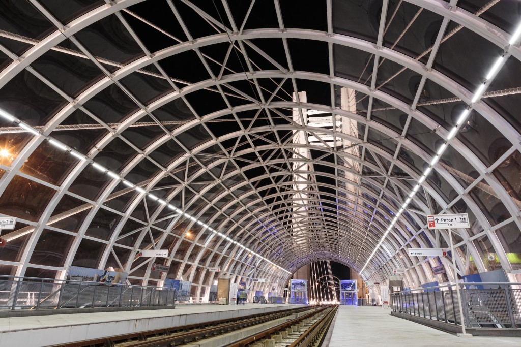 18114909 - large modern tram station on basarab overpass bridge, bucharest, romania, one of the largest suspension bridges in europe.